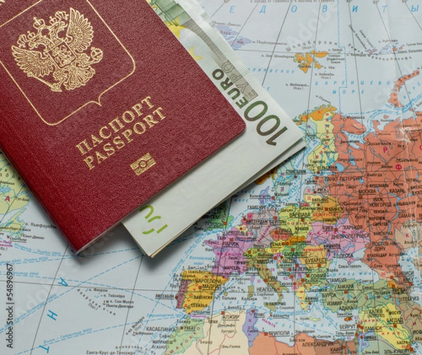 Obraz Заграничный паспорт гражданина России на карте мира