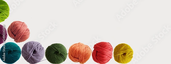 Fototapeta Balls of wool colored yarn for hand knitting and crochet on white background. Mock up, flat lay, copy space, banner