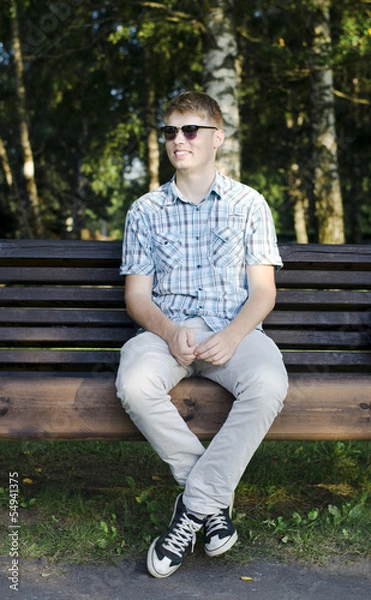 Obraz Smiling man on the bench