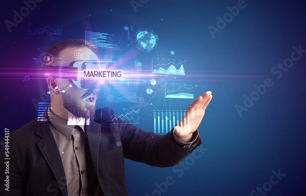 Fototapeta Businessman looking through Virtual Reality glasses