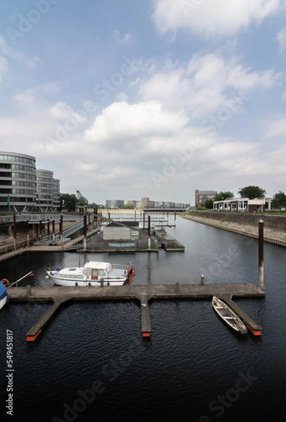 Obraz stilts and boats in port duisburg germany