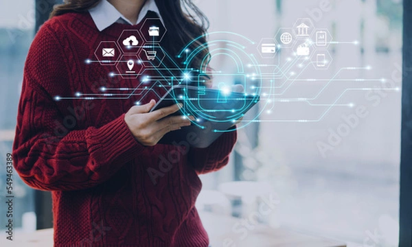 Fototapeta Cybersecurity and privacy concepts to protect data. Lock icon and internet network security technology. Businessman protecting personal data on smart phone with virtual screen interfaces.
