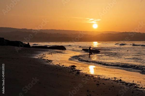 Fototapeta surfer at sunset