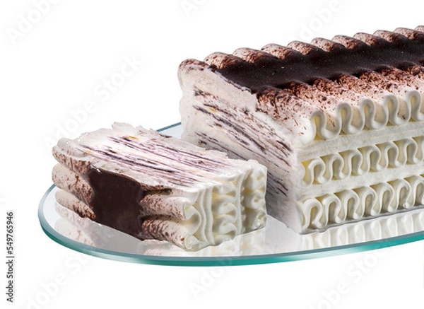 Fototapeta Viennetta-type ice cream cake, whipped cream with cocoa and chocolate flakes, sliced on a glass tray
