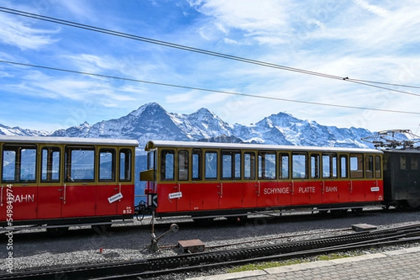 Fototapeta Schynige Platte railway with a view on mountain range Eiger Moench and Jungfrau