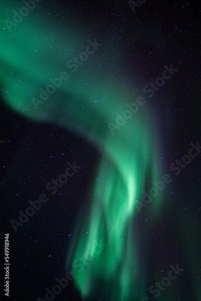 Fototapeta green aurora borealis over the sky