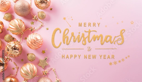 Obraz Christmas and new year background concept. Top view of Christmas ball, star and snowflake on pastel pink background.