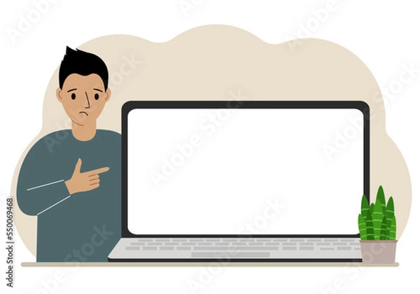 Fototapeta A man next to a large laptop with plenty of space for text.