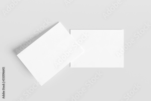 Fototapeta Blank white a6 postcard mockup with texture and shadow isolated on white background. 3d rendering