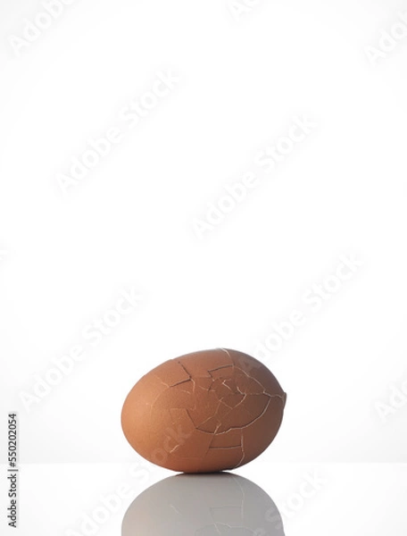 Obraz cracked egg on white background