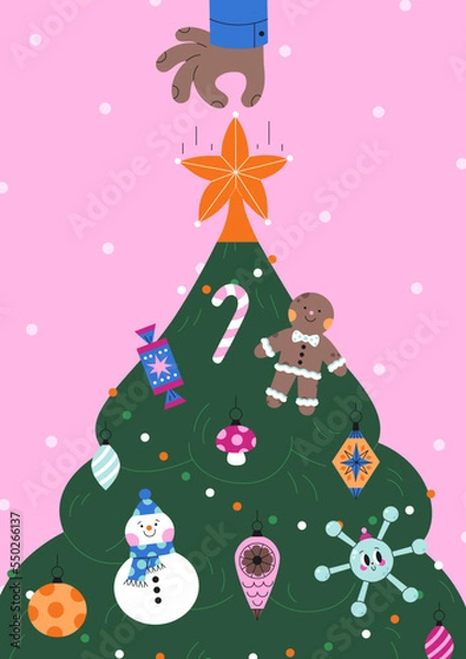 Obraz Hand decorates a Christmas tree with a star.