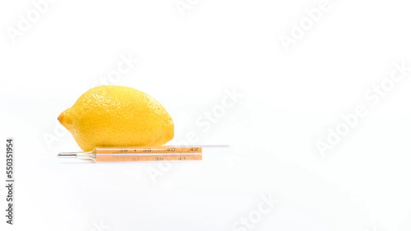 Fototapeta Thermometer with lemon on white background. Vitamins are important for immunity.