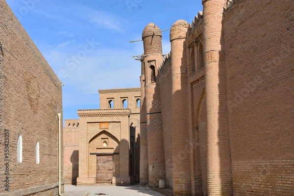 Fototapeta Old streets in oriental style of Khiva city in Uzbekistan with minarets, towers and mosques