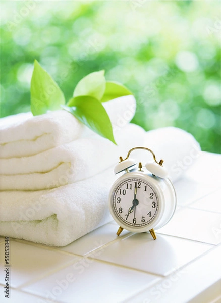 Obraz towels and alarm clock