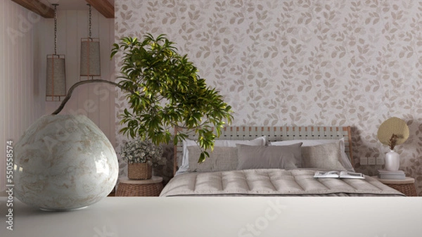 Fototapeta White mat table shelf with round marble vase and potted bonsai, green leaves, over modern wooden scandinavian bedroom with wallpaper, zen clean architecture concept idea