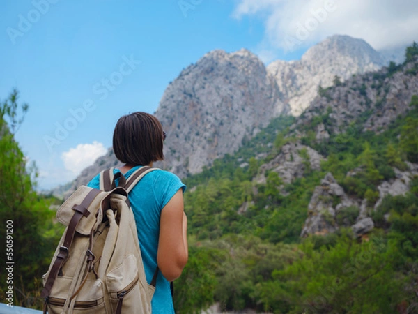 Fototapeta Tourist with backpack hike , Turkey travel, mediterranean area on a warm summer day lycian trail. concept of Zero waste travel, active lifestyle, summer vacation concept.