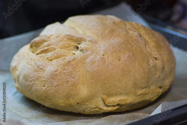 Fototapeta freshly homemade whitebread in the pan, closeup