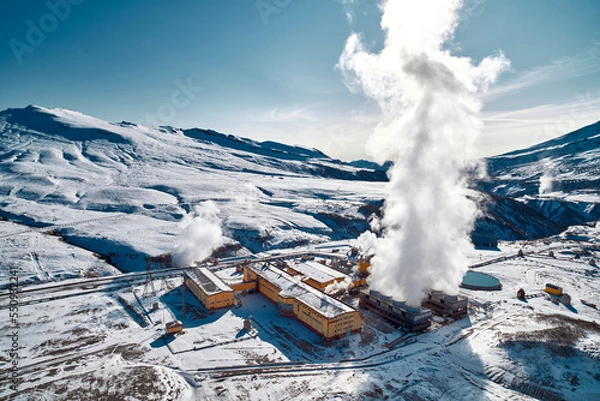 Fototapeta Aerial view to geothermal power plant in mountain. Clean green renewable energy in Kamchatka.