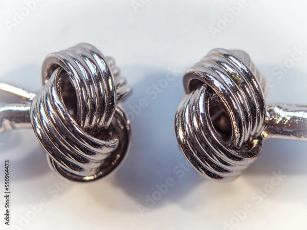 Fototapeta Triple knot pattern silver cufflinks