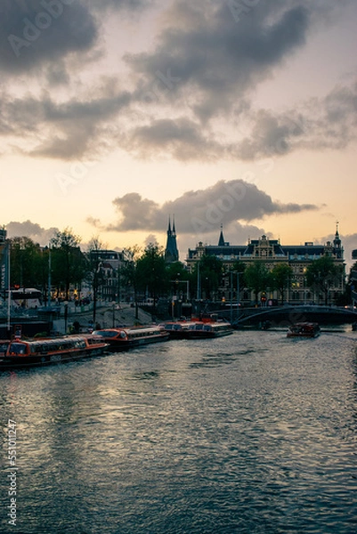 Fototapeta sunset over the canal