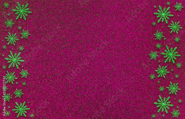 Fototapeta Winter purple magenta saturated bright background with random snowflakes two sideways. Christmas, New Year card with copy space.
