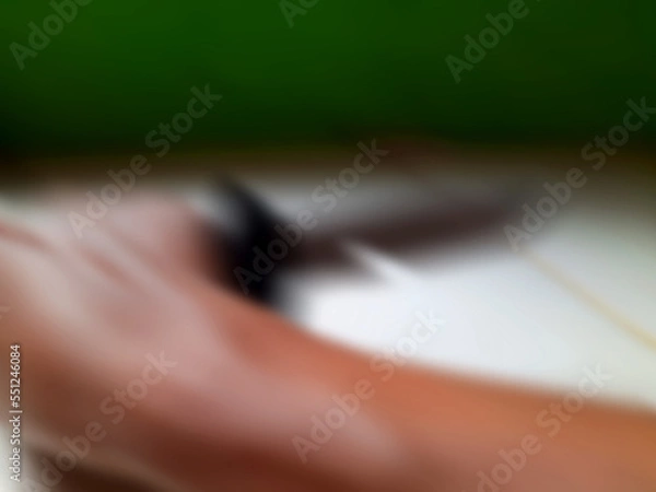 Fototapeta Abstract blurred background with a composition of green at the top, white in the middle, and brown at the bottom.