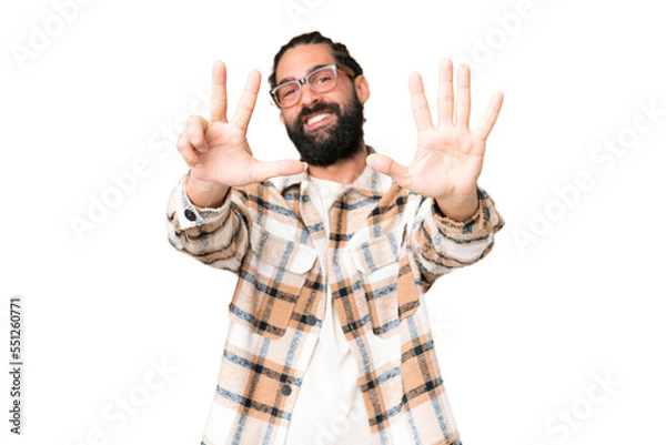 Fototapeta Young man with beard over isolated chroma key background counting eight with fingers