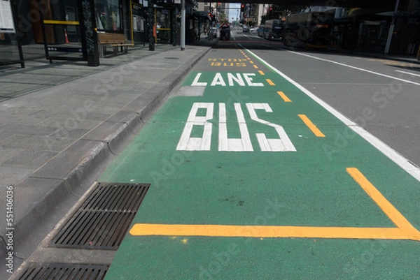 Fototapeta Bus Lane and Bus Stop have been painted on a city centre road to mark the lane for public transport