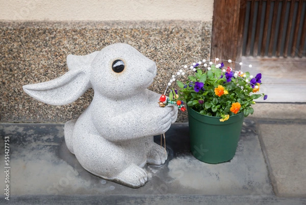 Fototapeta Rabbit statue for new year decorations at the front door of a house in Japan