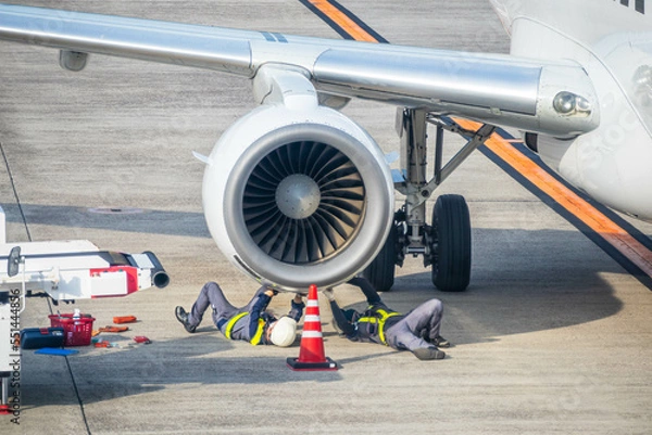Fototapeta 飛行機の整備士の仕事