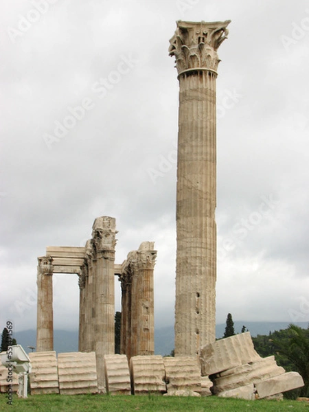 Obraz Athens, Greece - Several columns, one of which has fallen over, of The Temple of Olympian Zeus, also known as the Olympieion or Columns of the Olympian Zeus.