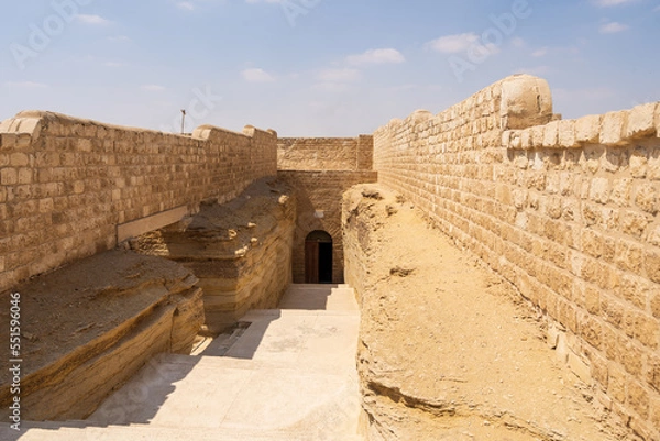 Fototapeta The entrance to the Serapeum, the ancient Egyptian burial place for sacred bulls (Apis) with the large sarcophagi for the mummified bulls in Saqqara, Egypt.  Travel and history.