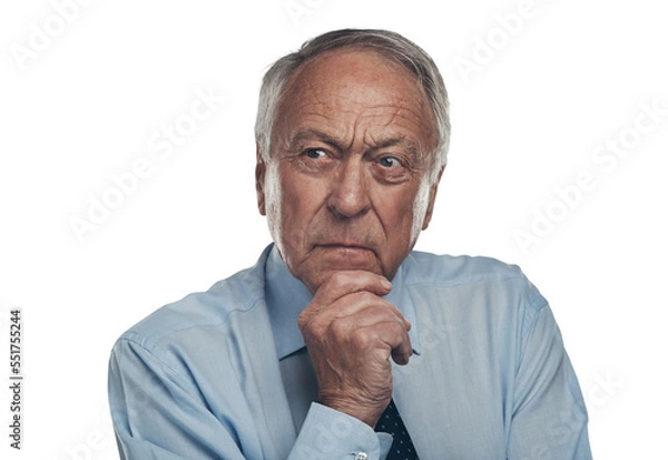 Fototapeta PNG shot of a senior businessman standing alone against a grey background in the studio and looking contemplative