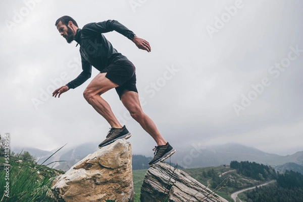 Obraz Man running in the mountains