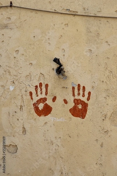 Fototapeta hand on the wall