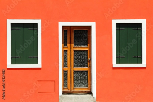 Fototapeta front door in vivid painted  house in Burano village