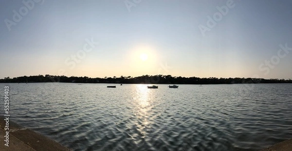 Fototapeta sunset over the river
