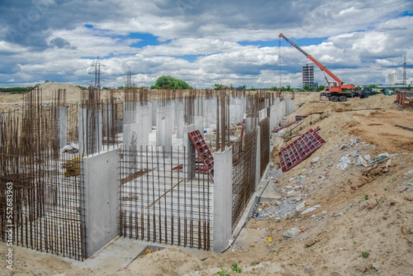 Fototapeta Vertical formwork panels on the construction of a residential building.