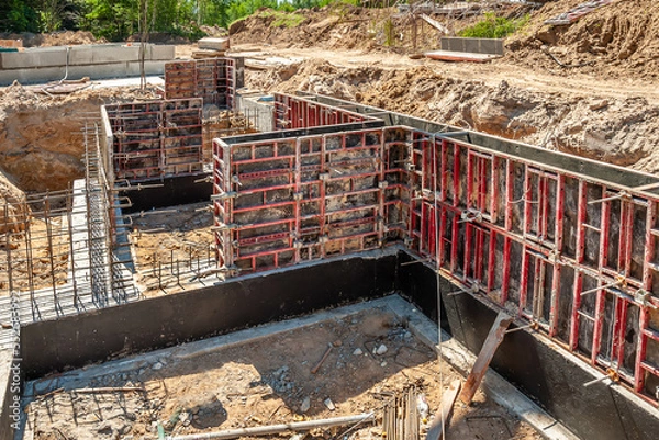 Obraz Vertical formwork panels on the construction of a residential building.