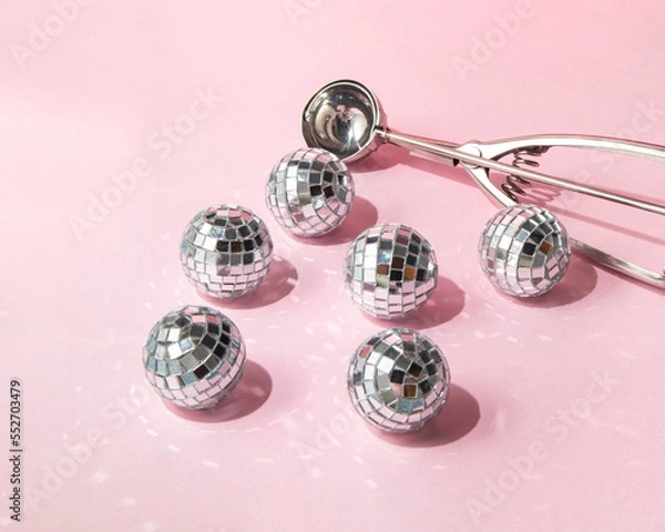 Fototapeta Christmas baubles as ice cream balls on pastel light pink background. Minimalistic New Year concept. Christmas flat lay. Creative Xmas composition.