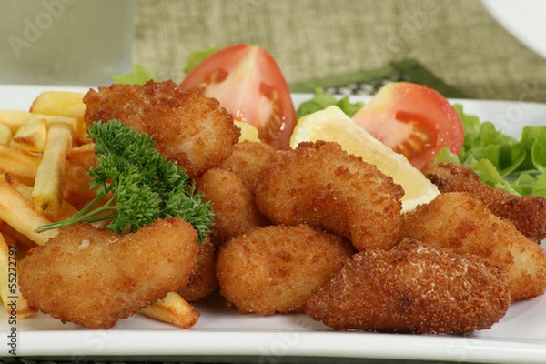 Fototapeta breaded scampi and chips