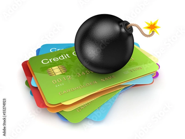 Obraz Black bomb on a stack of credit cards.