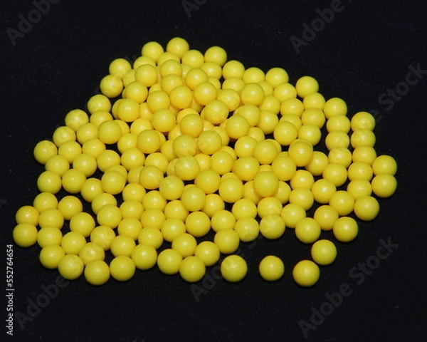 Obraz Vitamin ascorbic acid on a black background