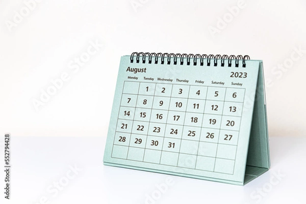 Fototapeta August 2023 calendar on white table. Month page
