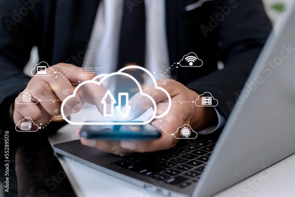Fototapeta Cloud computing concept - connect to cloud. Businessman or information technologist click on cloud computing icon.