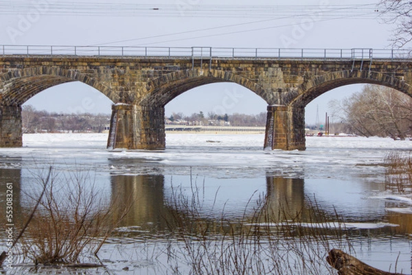 Obraz bridge over the river in winter