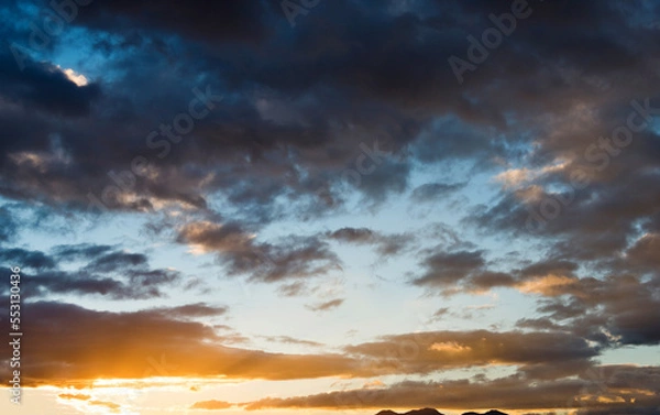 Fototapeta Beautiful sunset sky with clouds