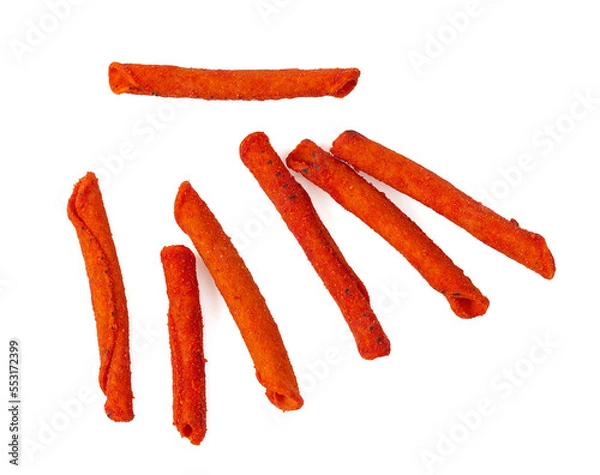 Obraz Pile of spicy corn chips isolated on white background. Hot rolled chips.