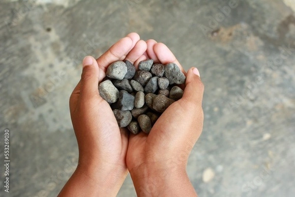 Obraz A Pebble in a Child's Hand