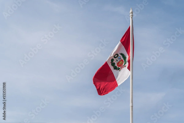 Obraz Peruvian flag flying in the sky